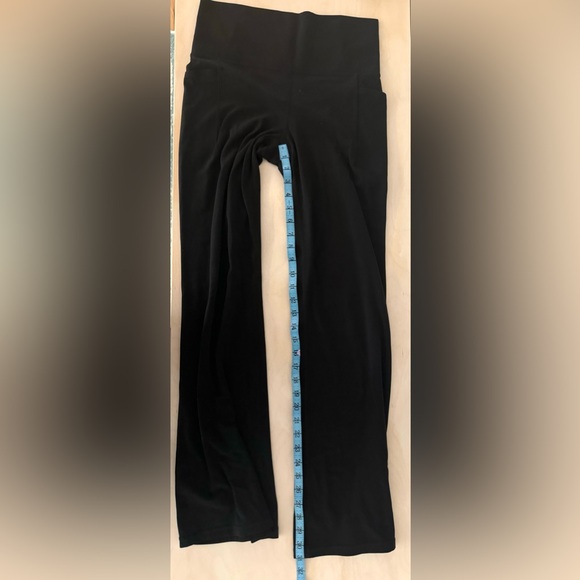 Athleta Salutation Stash flare pant black Medium - Picture 6 of 9